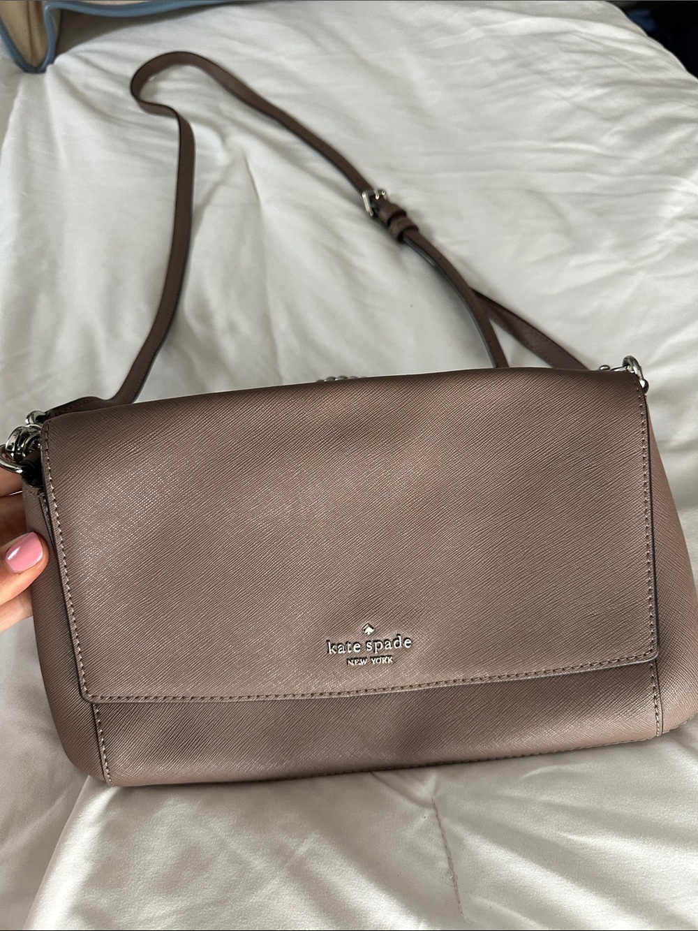 kate spade taupe crossbody bag with silver logo